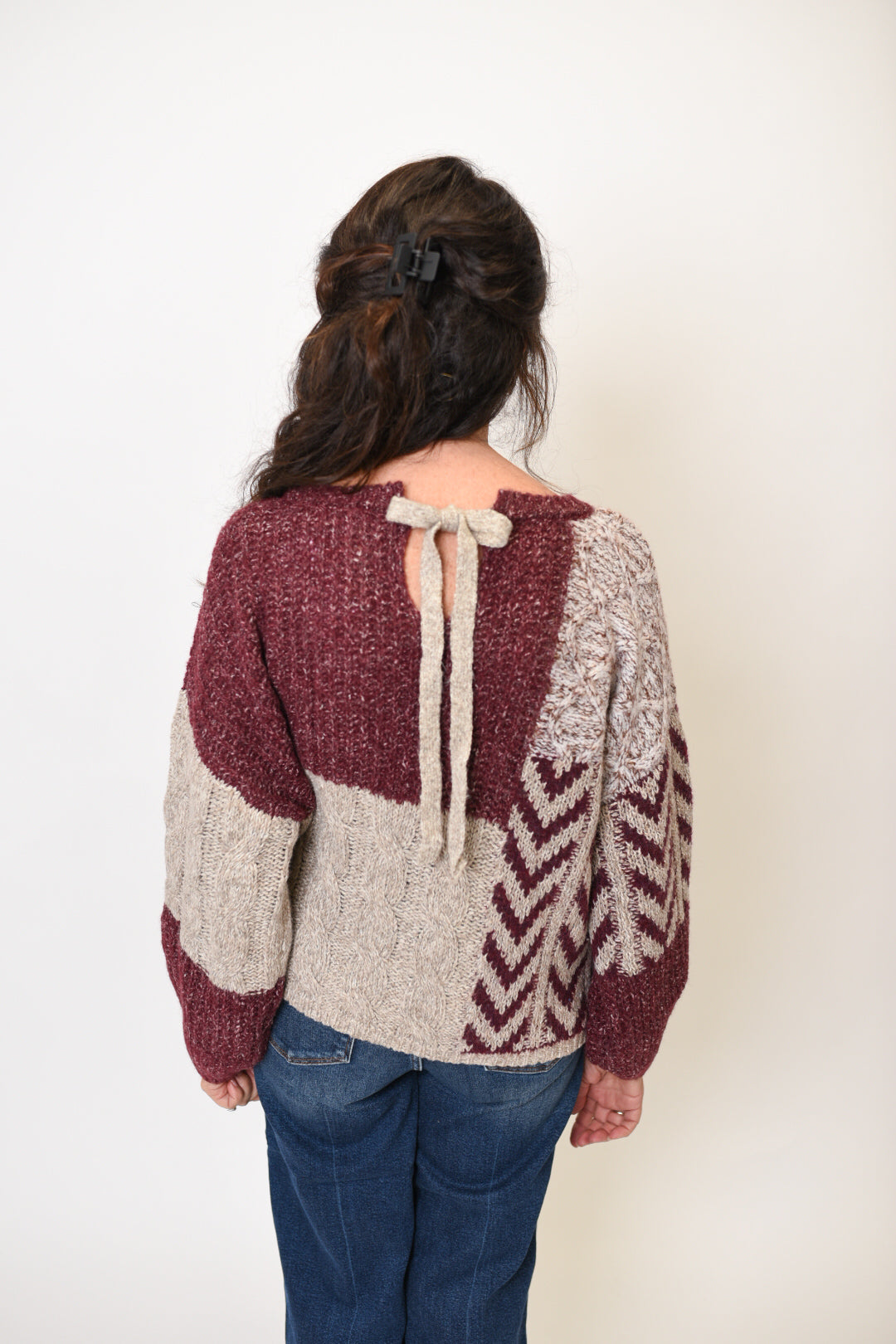 Bowed in Style Sweater in Wine Multi